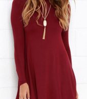photo Solid Color Turtleneck Stretch Knit Trapeze Dress by OASAP - Image 1