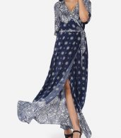 photo Bohemian Printed Split Cross Straps Loose Fitting Charming V Neck Maxi Dress by FashionMia, color Dark Blue - Image 1